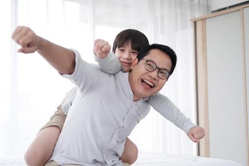 father and son with acuvue abiliti overnight therapeutic lenses for myopia