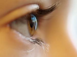 Girl eye with contact lenses